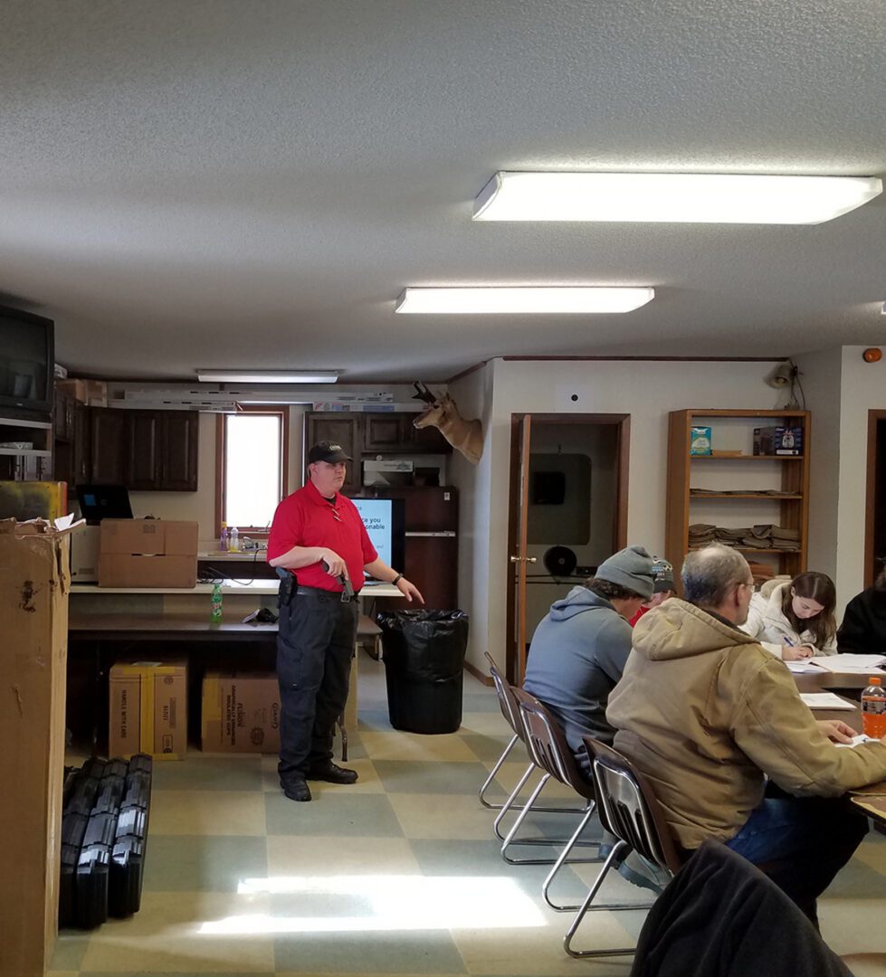 Man presenting to seated group