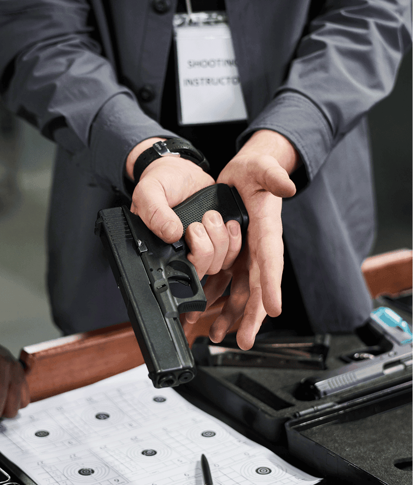 Instructor demonstrating handgun grip technique